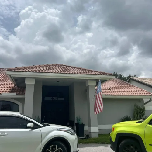 south florida home with tile rooftop